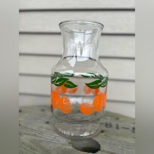 Vintage orange juice container.